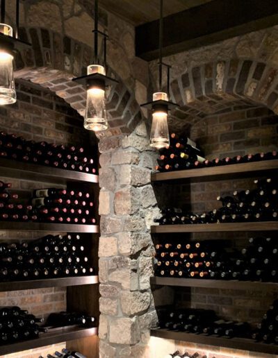 A wine cellar with a lot of bottles in it.